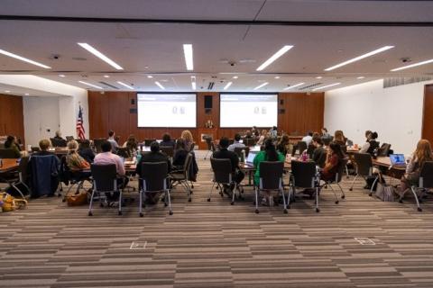 Participants of the CPFP Fall Symposium 2024 seated around tables in a conference room.